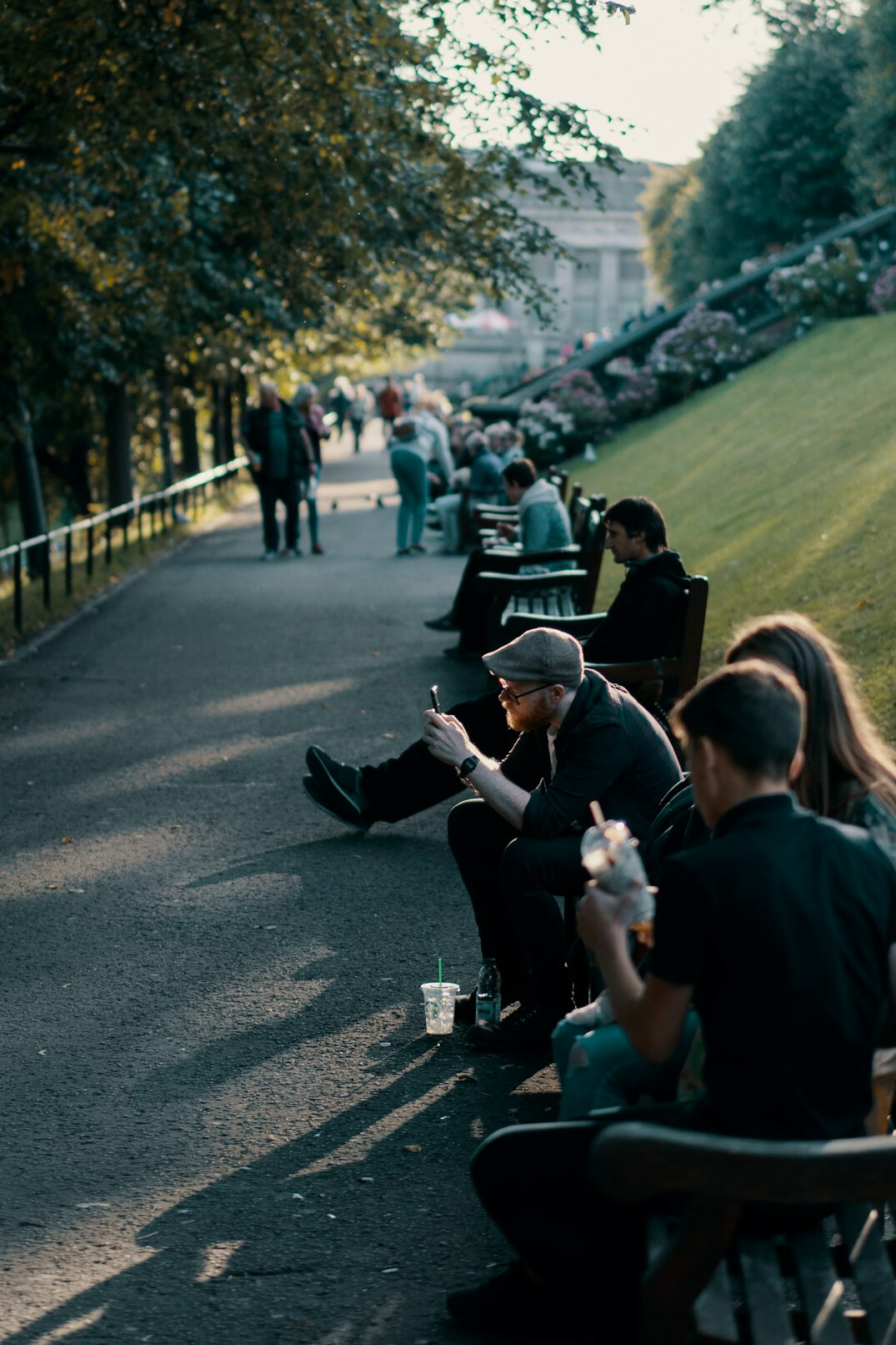 people using smartphones in public