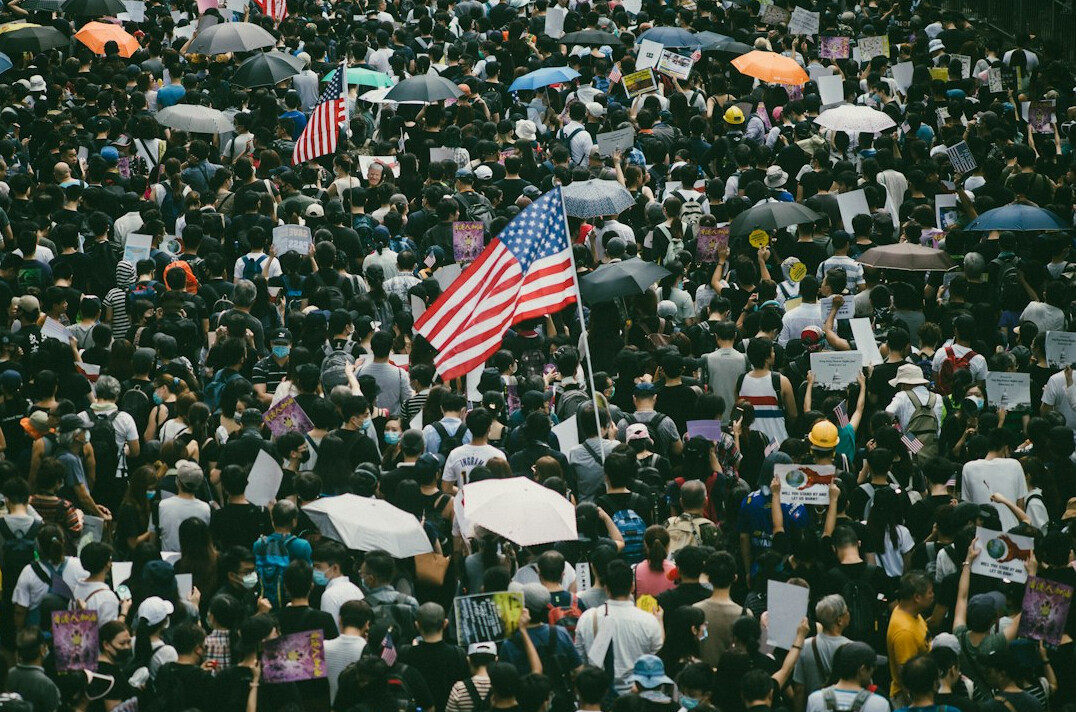 crowd protesting against government